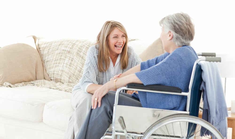 Seniors talking together in the livingroom Seniors talking together in the livingroom